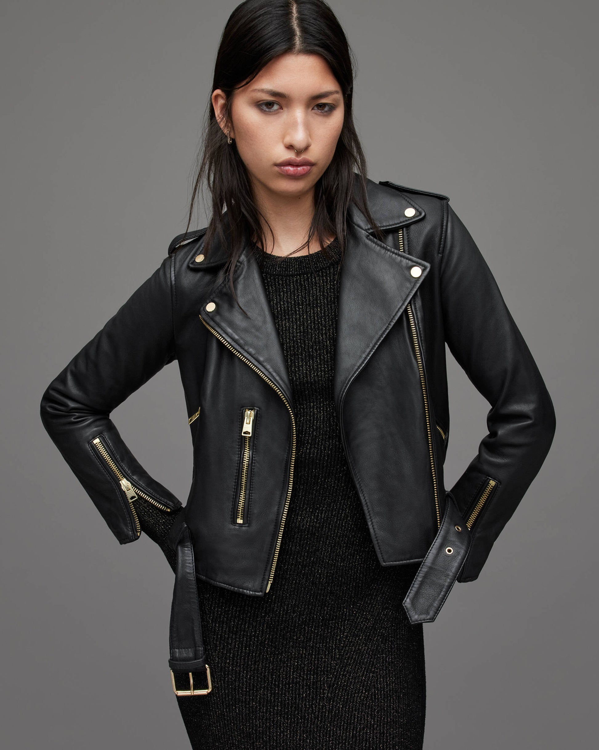 Stylish Women's Black Leather Biker Jacket with Gold Tone Zippers