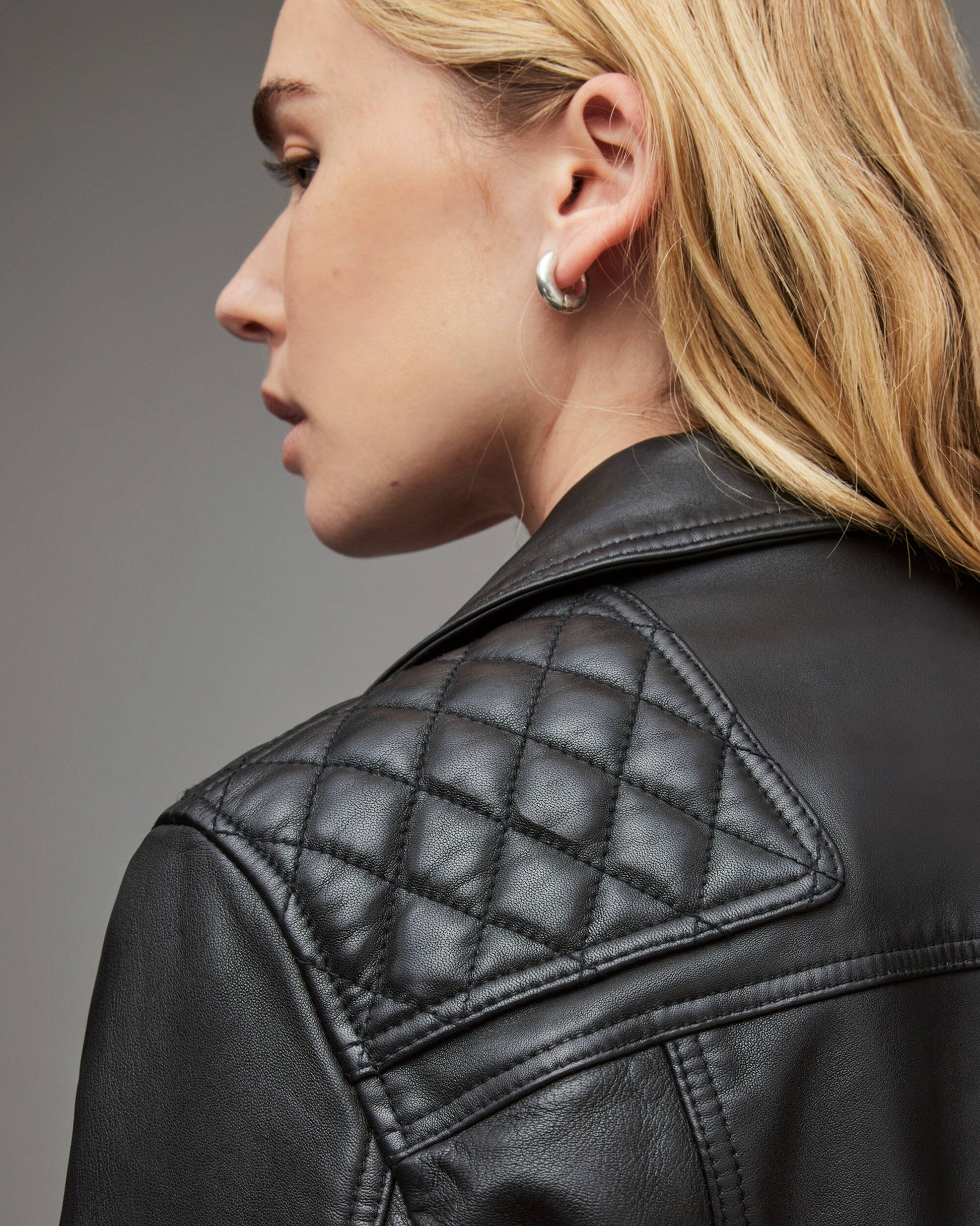 Sophisticated Women's Black Leather Biker Jacket with Quilted Shoulders