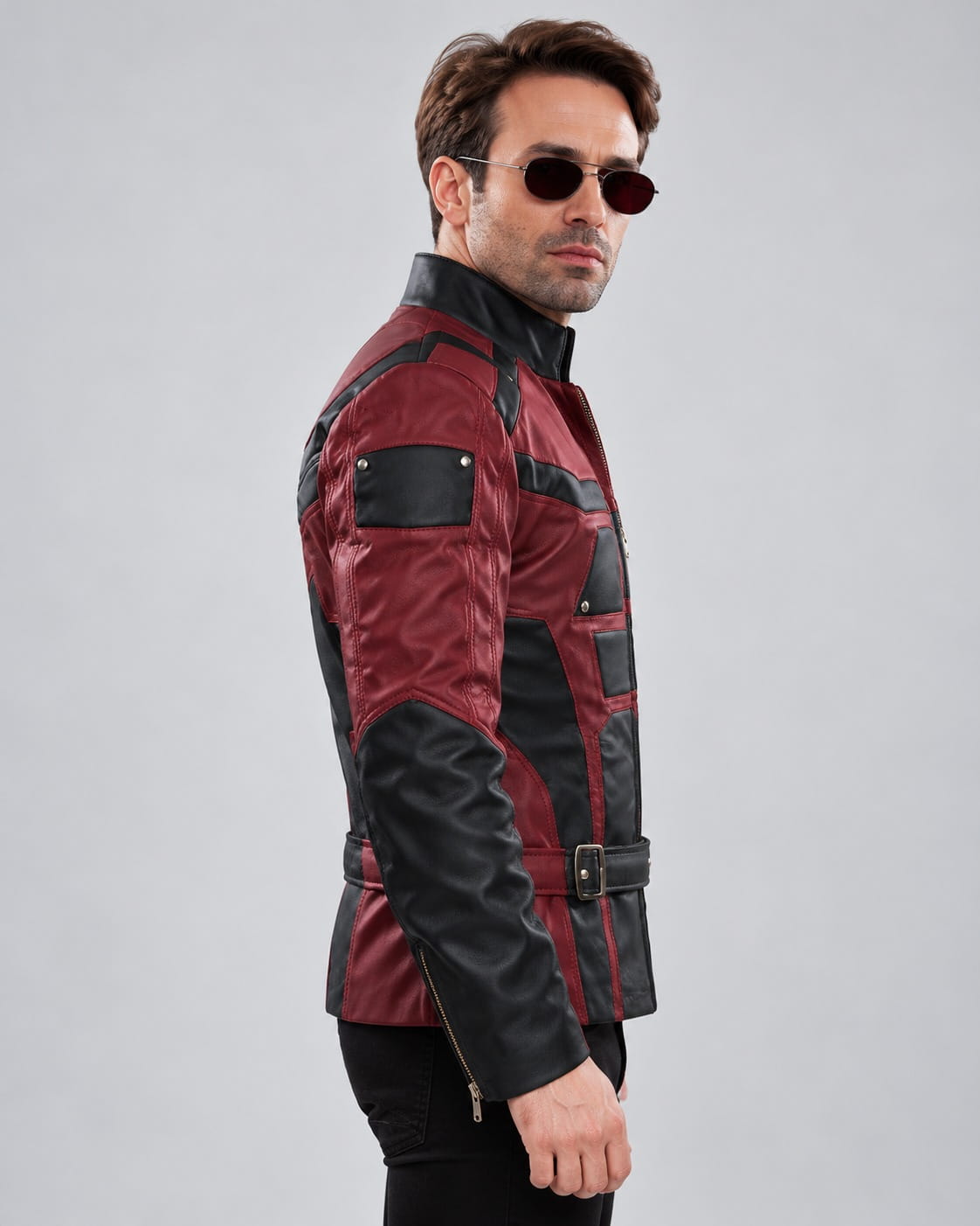 Side view of Men's Marvel’s Daredevil Charlie Cox Leather Jacket showing contrasting sleeves and belted waist.