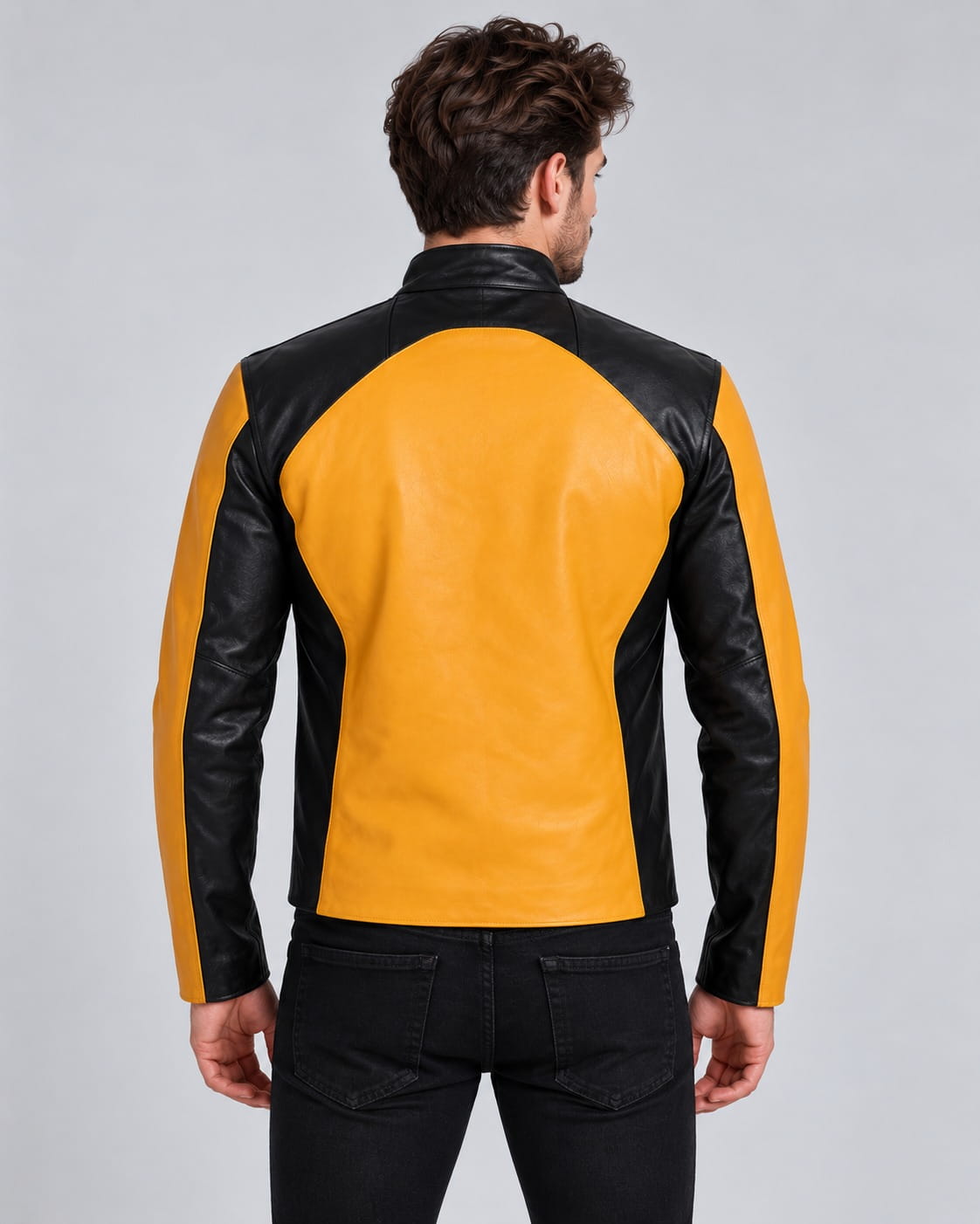 Back view of men’s yellow and black color-block genuine leather moto jacket
