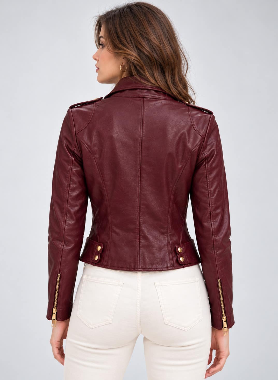 Back view of women's burgundy genuine leather biker jacket with shaped seams and shoulder epaulettes