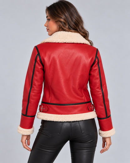Back view of women’s red Christmas genuine leather jacket with cream hem trim